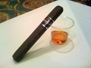 A photo of the Nomad S-307 and a plastic cup with Buffalo Trace bourbon.